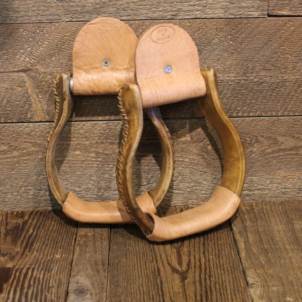 Showman™ rawhide covered stirrups with leather lacing. – Dark Horse Tack  Company